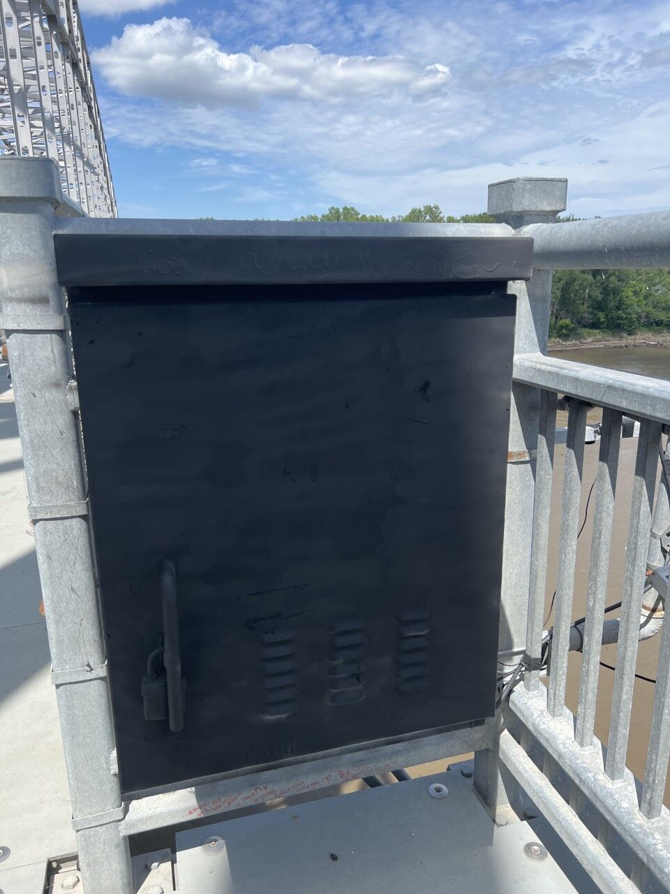 IMAGE 2: Graffiti supporting white nationalist group removed from Jefferson City bridge